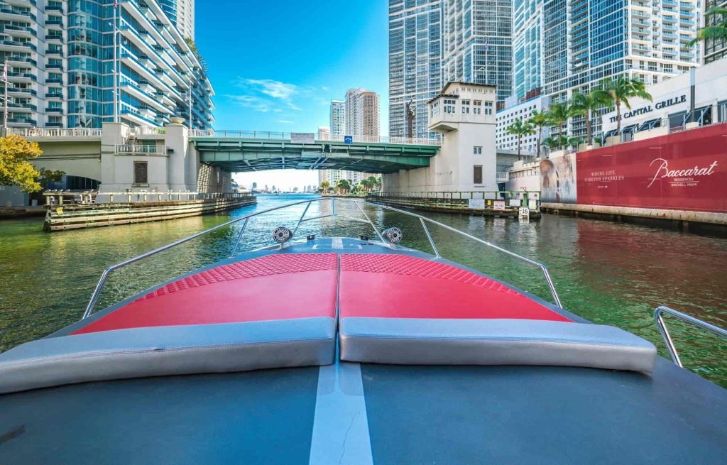 View from a car driving through Brickell surrounded by skyscrapers, Miami neighborhood guides
