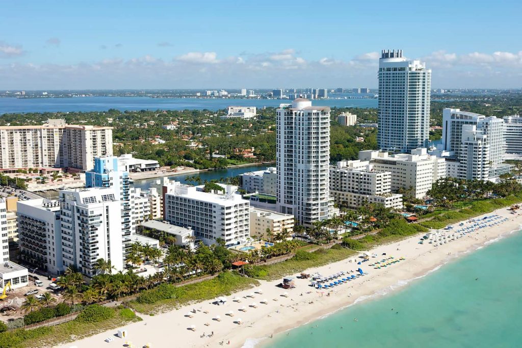 Aerial view of Miami Beach coastline and resorts, Miami neighborhood guides