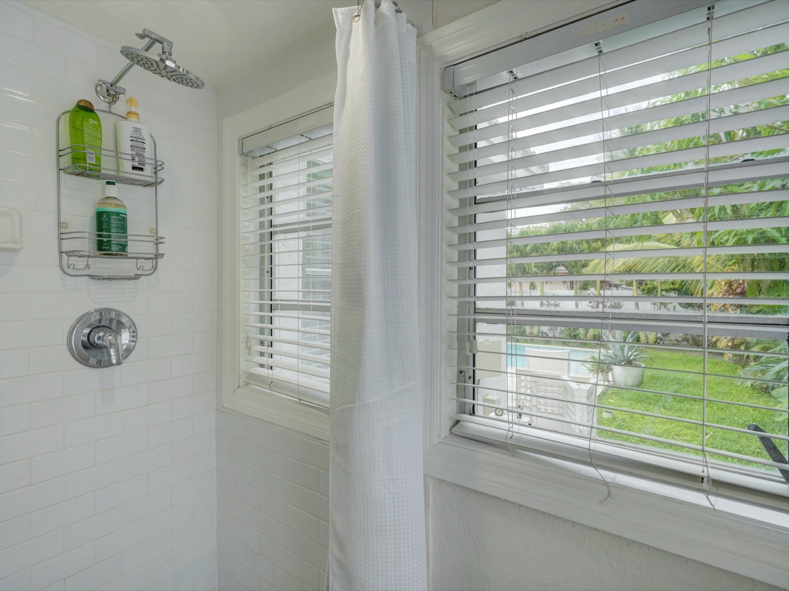 Bathroom with pool view window