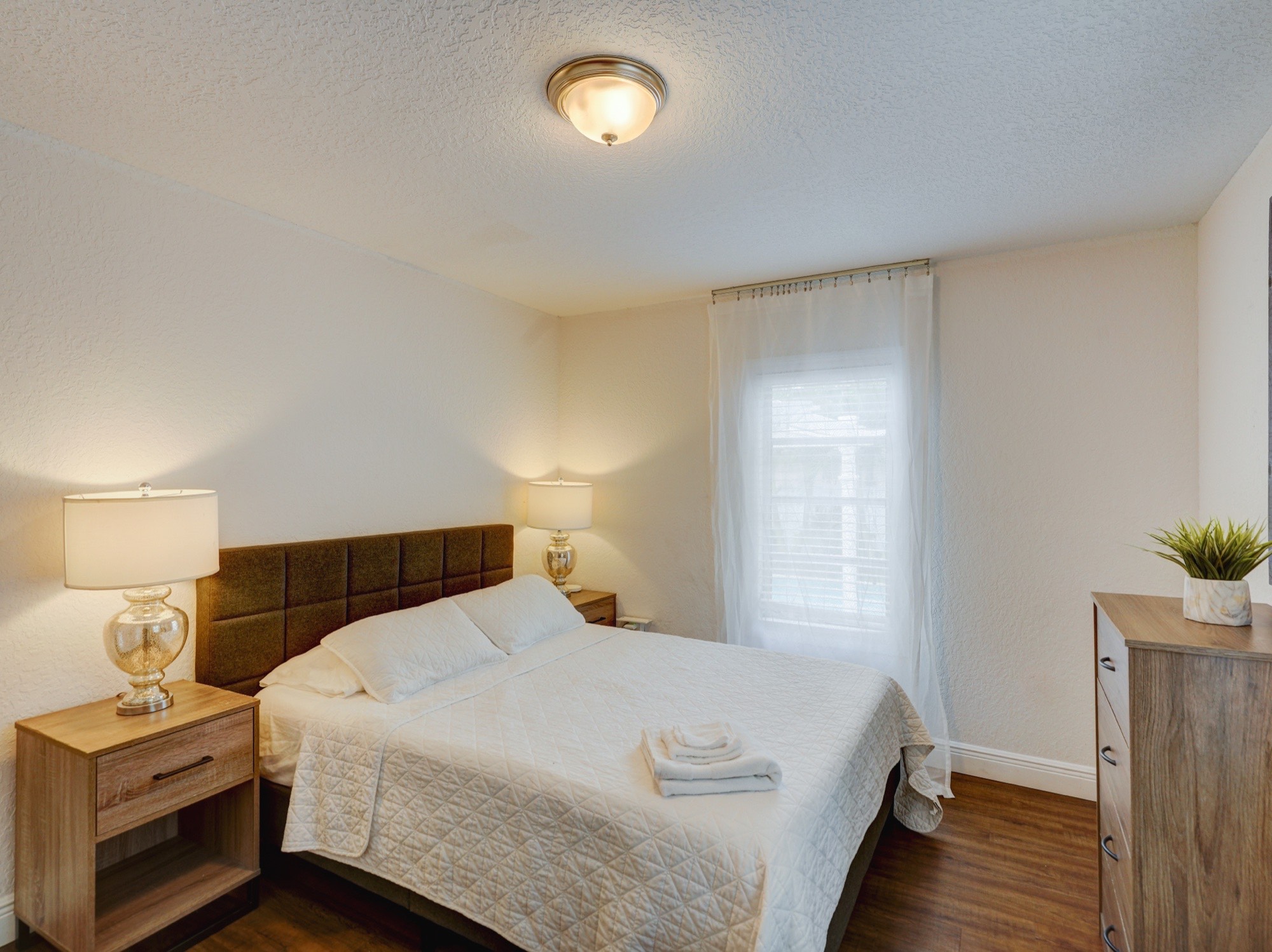 Bedroom — bright white walls