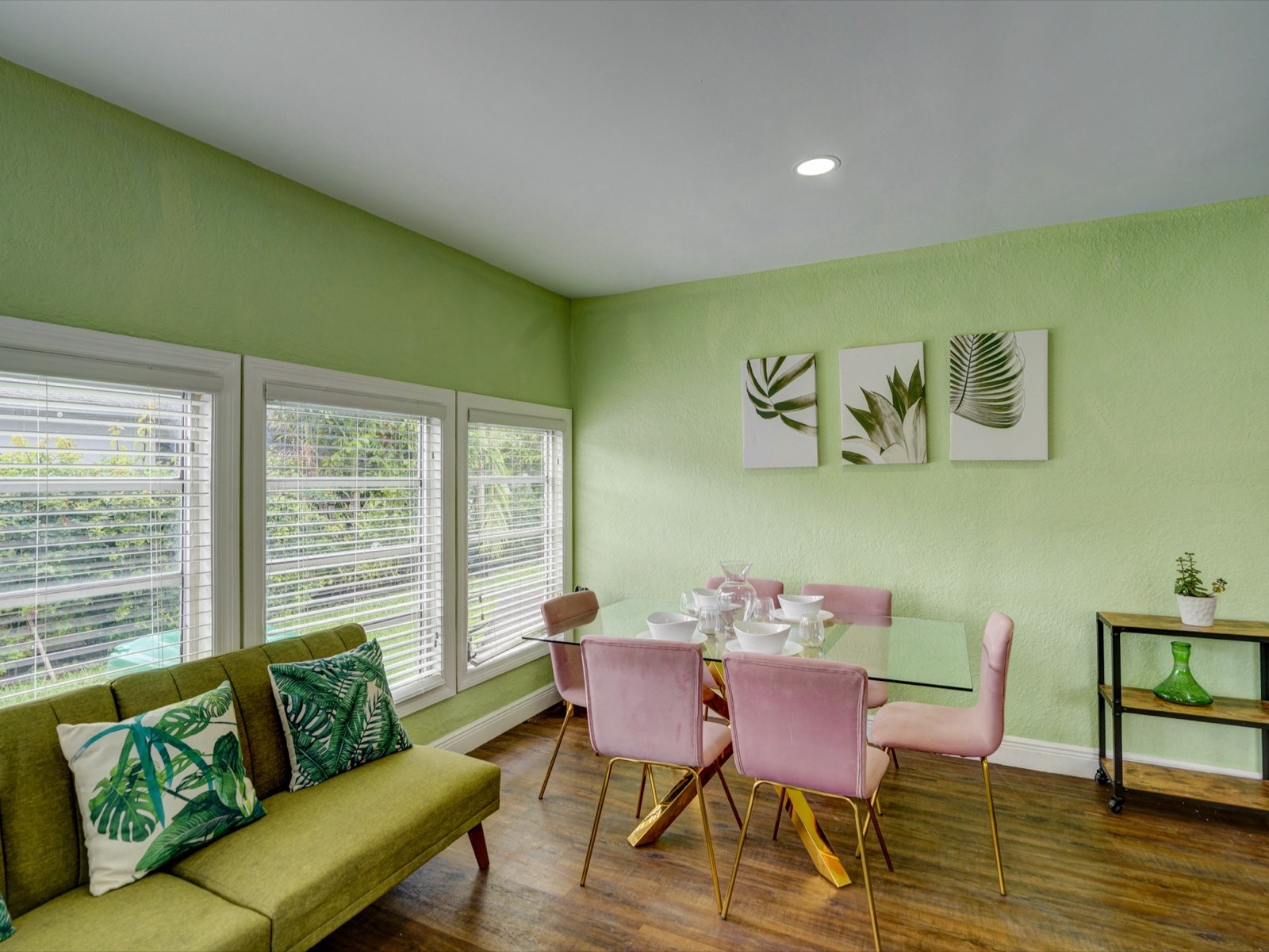 Casa Bonita dining with pink chairs