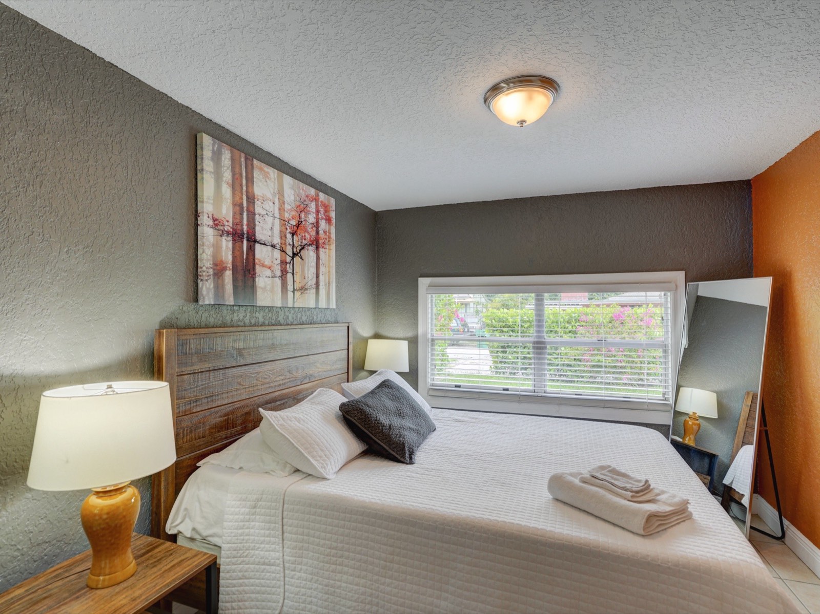 Bedroom — grey and orange walls
